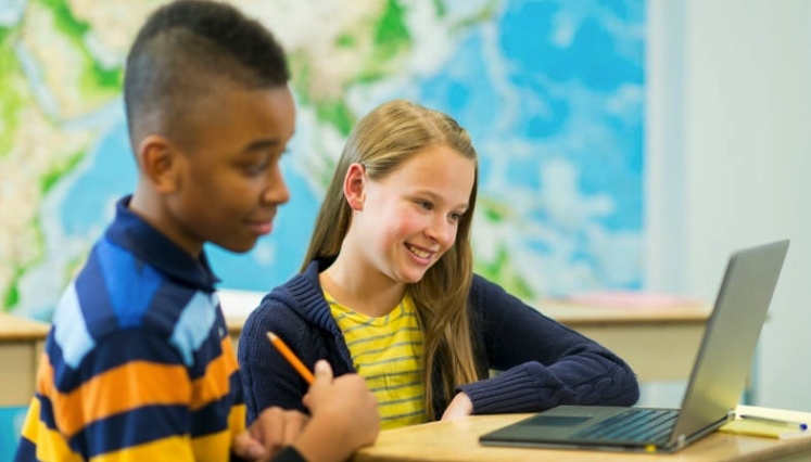 Two Children Studying in a Classroom