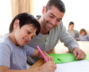 Dad helps Elem Student
